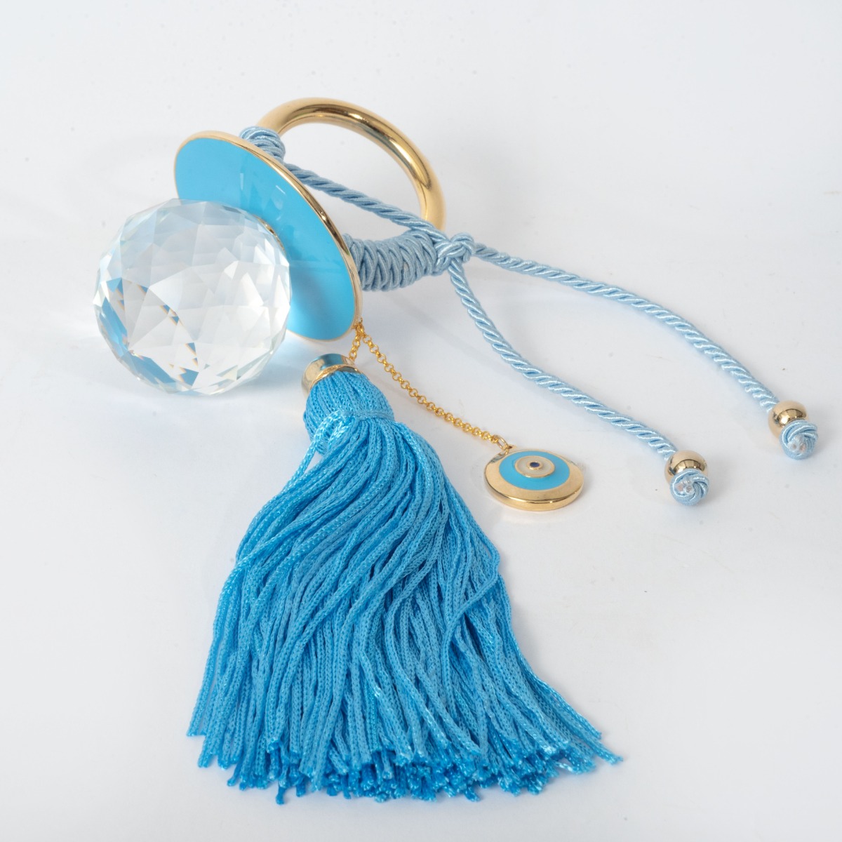 Παιδικό γούρι ορείχαλκος, κίτρινο επιχρύσωμα 24Κ, πιπίλα κρύσταλλος και μάτι από σμάλτο